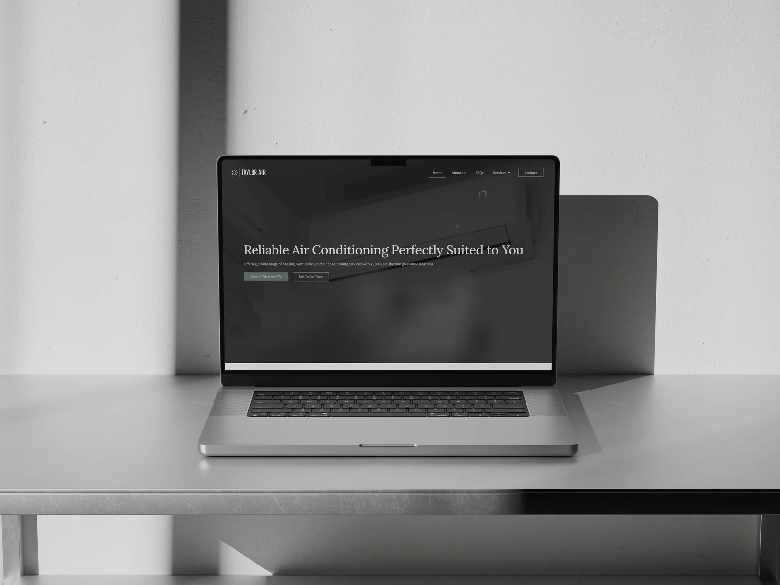 taylor air laptop on desk