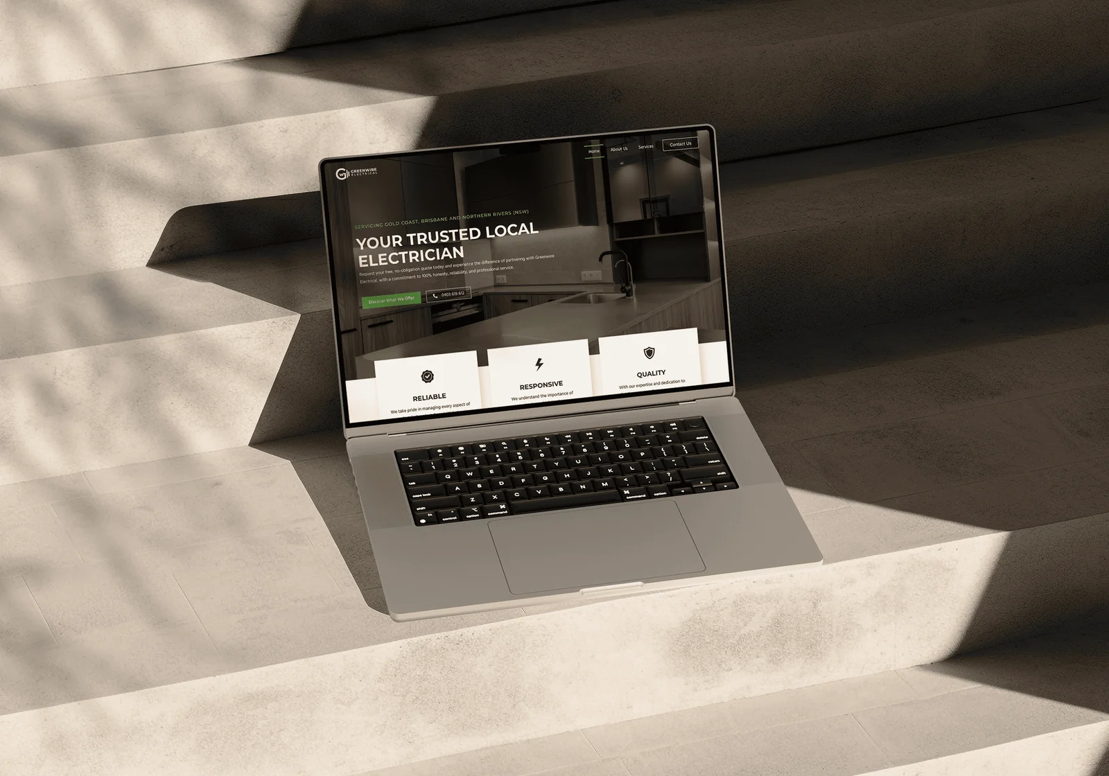 laptop-stairs-with-greenwire-electrical-website